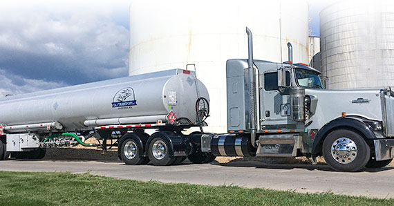 Commercial liquid fuel tanker with divided compartments